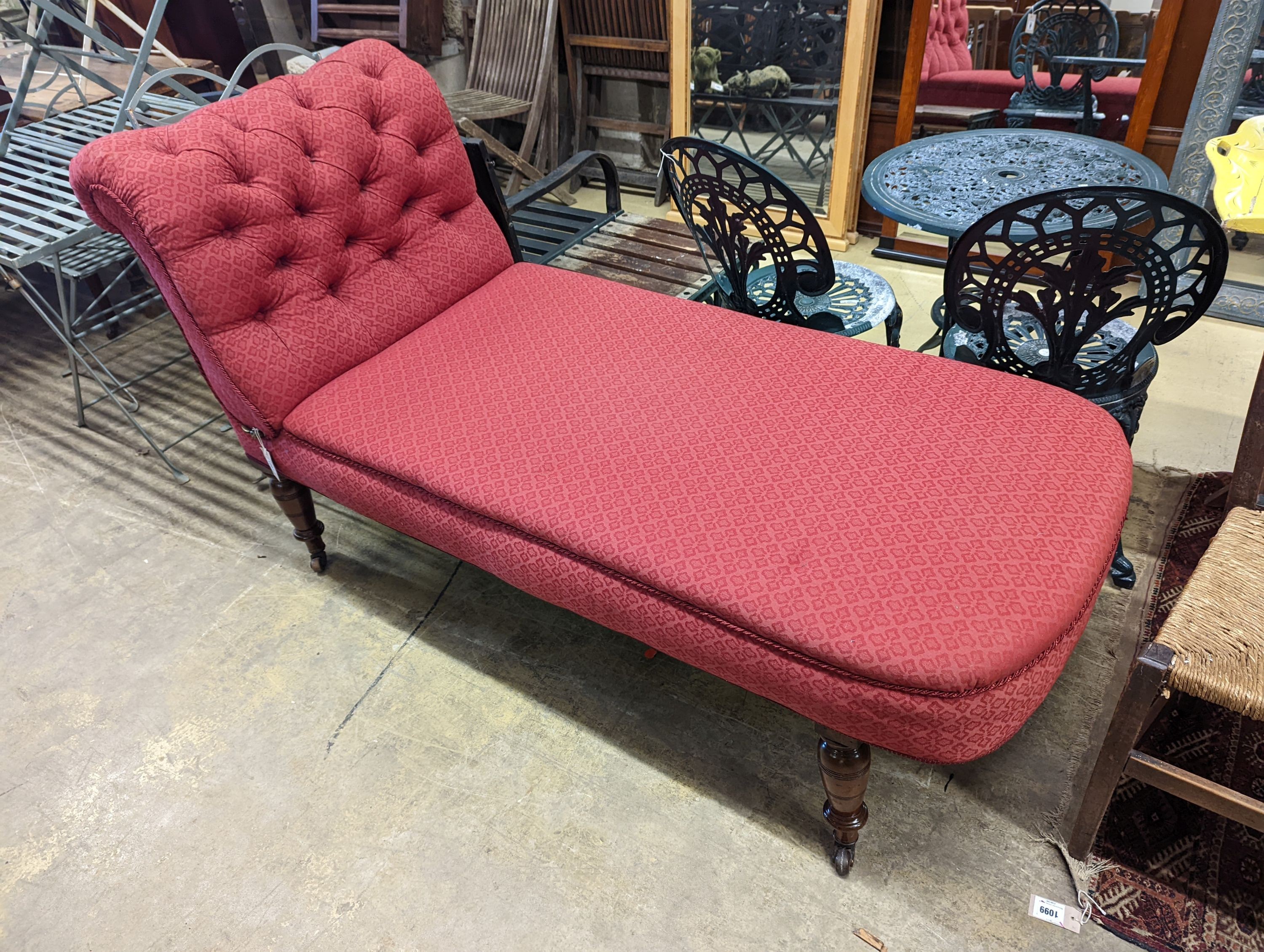 A Victorian mahogany drop arm daybed upholstered in buttoned red fabric, length 160cm, depth 70cm, height 96cm